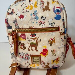 NWT. Disney Dogs Dooney & Bourke Bag - Santa Tails Backpack. Disney leather bag